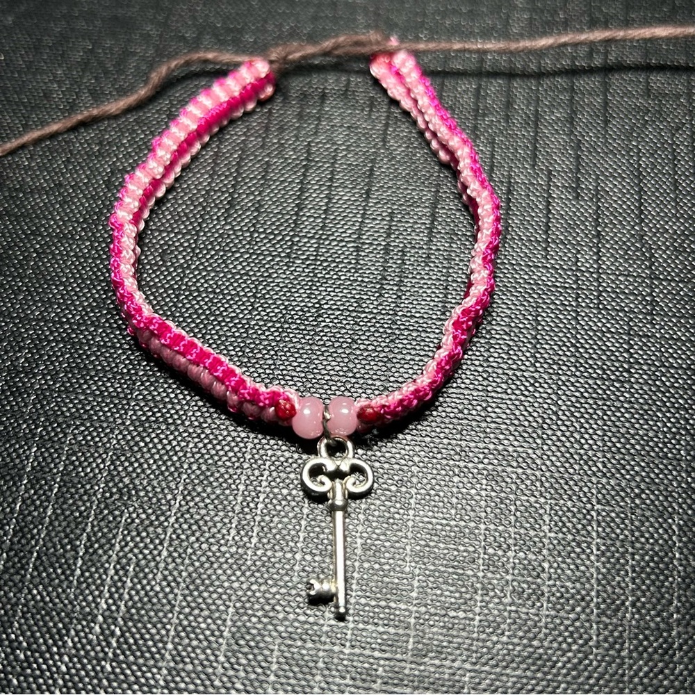 Pink Two Toned Square Knot Bracelet with Silver Key Charm and Beads